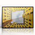 Large abstract wall art depicting a stylized Berlin skyline in muted gray and blue tones, framed in black acrylic.