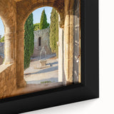 Black wall art featuring a textured view of Rhodes, Greece in vibrant colors on a framed canvas.