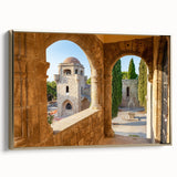Framed canvas wall art depicting a vintage-style landscape of Rhodes, Greece, with muted gold and black tones.