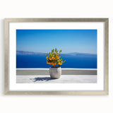 Extra large abstract art print of Santorini with textured white buildings and blue skies on a framed canvas.