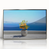 Large art print of Santorini scenery in silver framed acrylic.