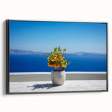 Black and white framed canvas of Santorini landscape, ideal for bedroom wall art.