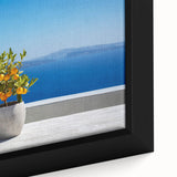Extra large framed canvas depicting a textured Santorini scene with vivid blue and white colors, ideal for living room decor.