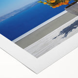 Art deco poster of Santorini landscape in muted blue and white tones on rolled canvas, suitable for dining room wall art.