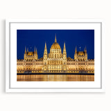 Textured art depicting an abstract European scenery in muted earth tones, framed with a white mat.