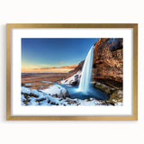 Abstract art print of a serene Icelandic landscape in muted blues and greens, framed in gold, ideal for dining room decor.