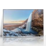 Mid-century modernist art depicting a serene Icelandic landscape in muted blue and green tones on framed acrylic.