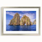 Extra large wall art depicting a textured abstract scene of Capri, Italy in muted earth tones, framed in silver.