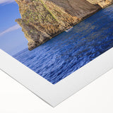 Art deco poster of Capri, Italy in muted blue and green tones on rolled canvas, suitable for dining room wall art.