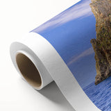 Art deco poster of Capri, Italy, featuring muted blue and peach tones on rolled canvas.