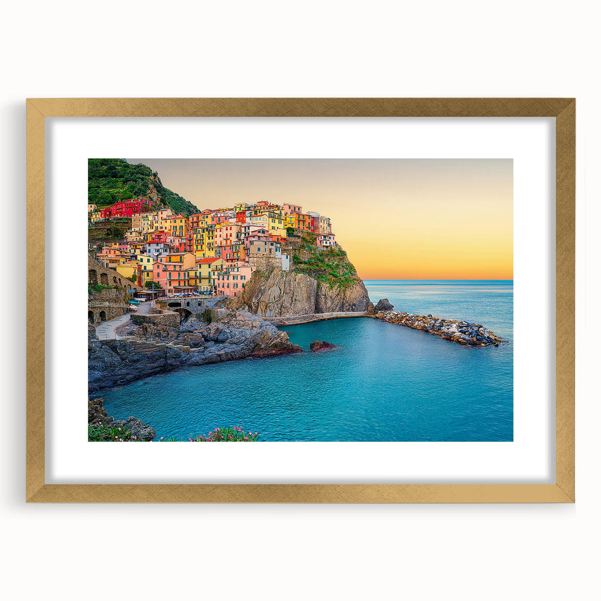 Abstract art print of Cinque Terre with vibrant coastal colors on a framed gold mat, ideal for dining room decor.