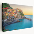 Large wall art on canvas featuring a panoramic view of Cinque Terre with vibrant coastal colors, ideal for kitchen wall art.