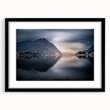 Colorful art print of Lake Como with abstract textures in vibrant hues, framed in black, ideal for living room decor.