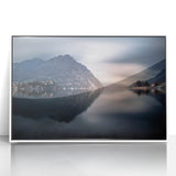 Mid-century modernist art of Lake Como with muted blue and green tones on a framed acrylic, ideal for nursery wall art.