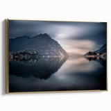 Framed canvas wall art featuring a vintage-style landscape painting of Lake Como with muted blue and green tones.