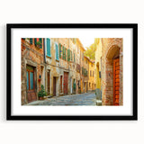 Abstract art print of the Tuscan landscape in vibrant colors on a large framed canvas, suited for living room decor.