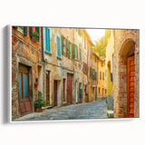 Vintage poster art of Tuscany landscape on framed canvas, featuring colorful fields under a blue sky.