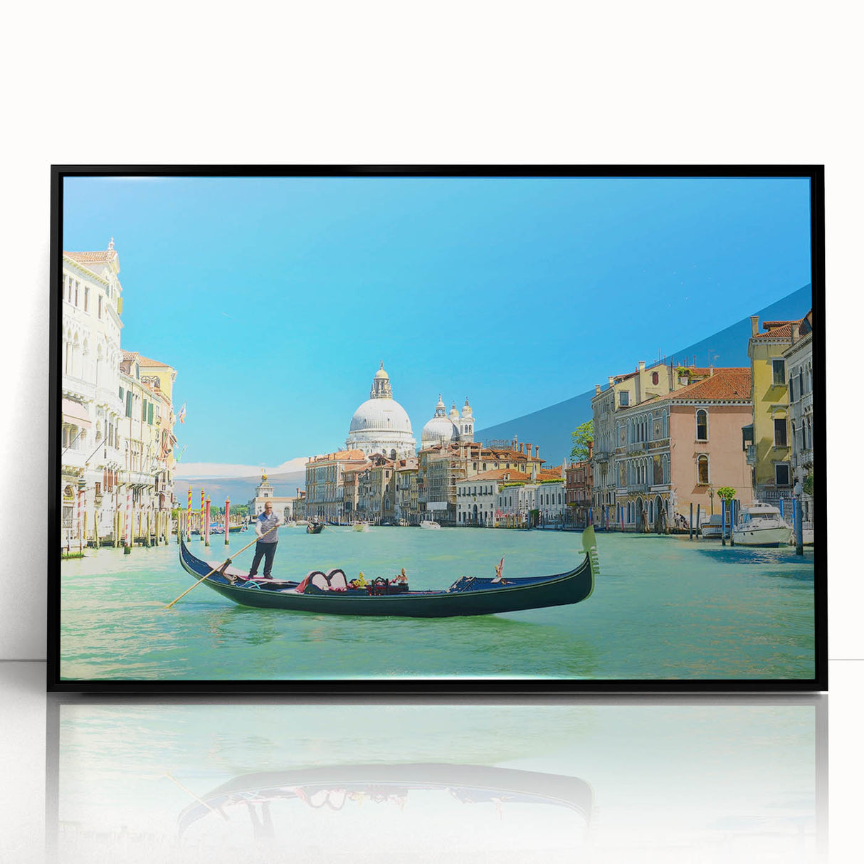 Large abstract wall art depicting a Venetian canal scene, in muted blues and grays on a framed acrylic.