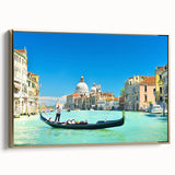 Framed canvas featuring a vintage-style landscape painting of Venice in muted gold and black tones.