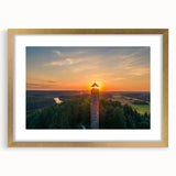 Abstract art print of a European Lithuanian landscape in muted earth tones, framed in gold, suitable for dining room decor.