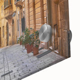 Large abstract wall art of Malta scenery in muted earth tones on acrylic glass, ideal for dining room decor.