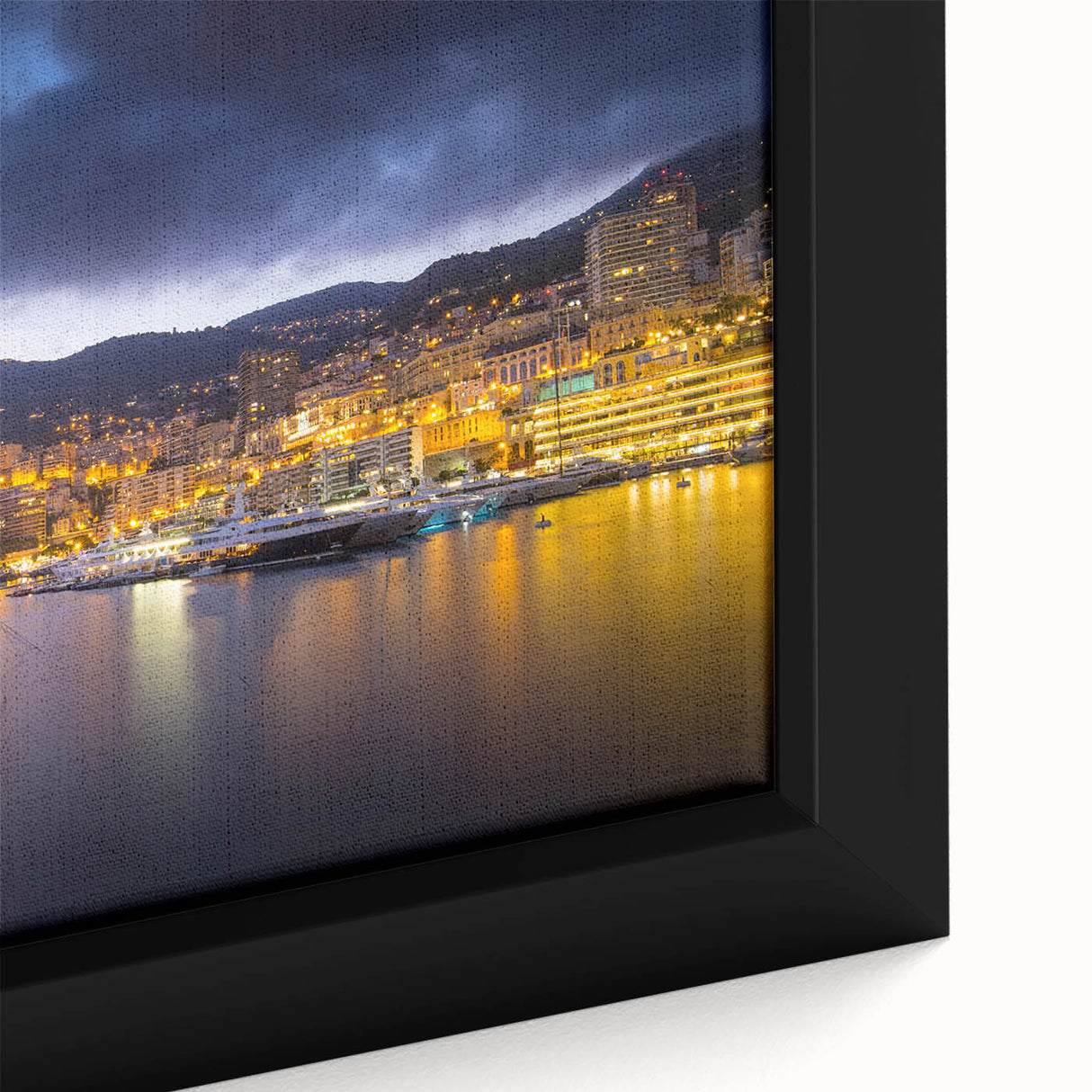 Close-up of a textured, extra large black wall art featuring colorful Monaco scenery on framed canvas.