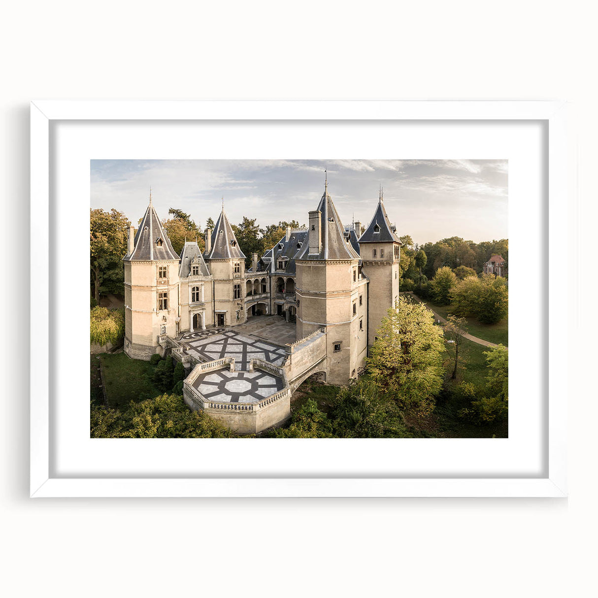Textured abstract art print of a European scenery in muted earth tones on a framed white canvas, ideal for bedroom art.