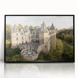 Large abstract wall art depicting a European cityscape in muted grays and blues on a framed acrylic.