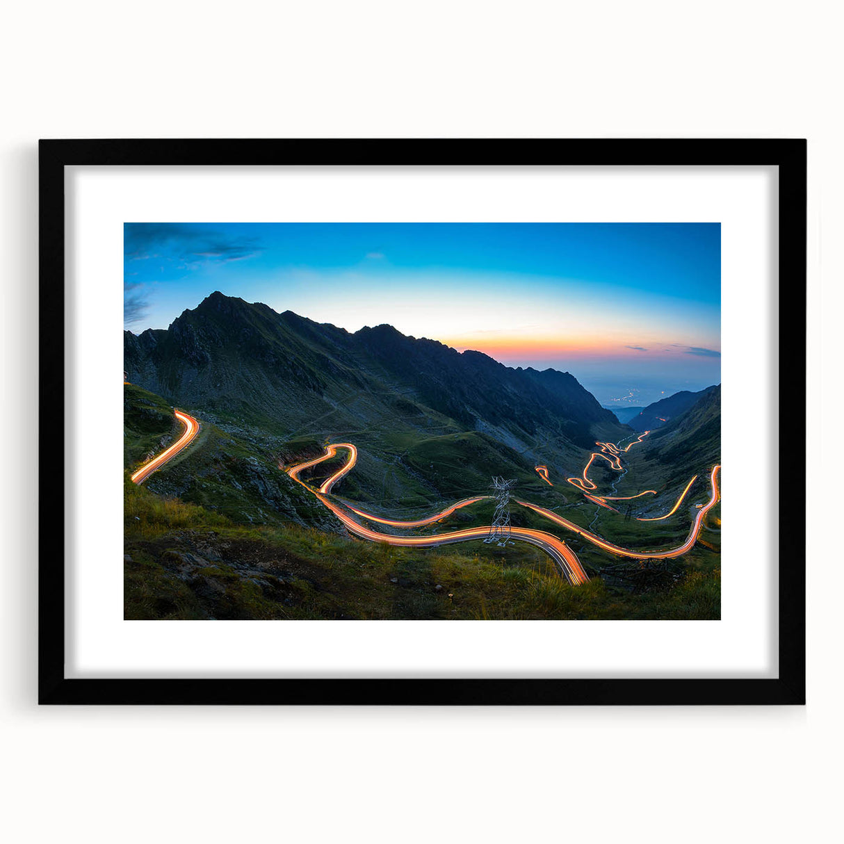 Extra large abstract art print of a colorful, textured European scenery on a black framed canvas.