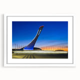 Textured abstract art print depicting a European scenery in muted earth tones, framed with a white mat.