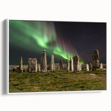 Vintage poster art of a Scottish landscape on framed canvas, featuring vibrant colorful art against a black background.