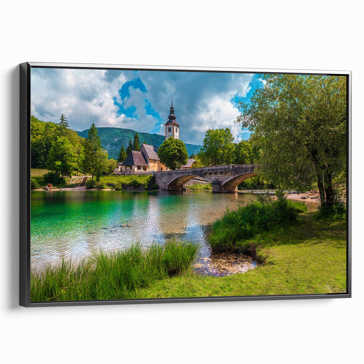 Black and white wall art featuring a vintage poster art style landscape of Slovenia on framed canvas.