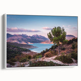 Framed canvas of a vintage Andalucian landscape in muted earth tones, ideal for bedroom wall art.