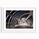 Abstract art print of Madrid scenery in muted earth tones on a white framed canvas, ideal for dining room decor.