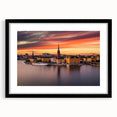 Abstract art print of Stockholm scenery in vibrant colors on a large framed canvas, ideal for living room decor.