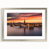 Textured art print of abstract Stockholm scenery in muted gray and blue tones, framed in silver, ideal for bedroom art.