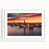 Abstract art print of Stockholm scenery in muted blue and gray tones on a framed white mat, ideal for dining room decor.