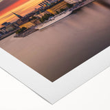 Art deco poster of Stockholm scenery in muted blue and yellow tones on rolled canvas, suitable for dining room decor.