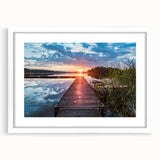 Abstract art print of a serene Swedish landscape in muted green and blue tones on a framed white canvas.