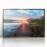 Large art print of a serene Swedish landscape in muted green and blue tones, framed in gold acrylic.