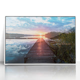 Acrylic print of a serene Swedish landscape in soft pastel colors, framed in white.