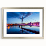 Textured abstract art print of a serene Welsh landscape in muted earth tones, framed with a silver mat.