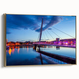 Framed canvas featuring a vintage-style landscape painting of Welsh scenery, in muted earth tones.