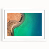 Abstract art print of Baja California scenery in muted earth tones, framed with a white mat, suitable for dining room decor.
