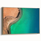 Framed canvas wall art depicting a vintage-style landscape of Baja California in muted earth tones, ideal for bedroom decor.