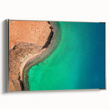 Framed canvas depicting a vintage-style landscape of Baja California with a colorful palette on a black background.