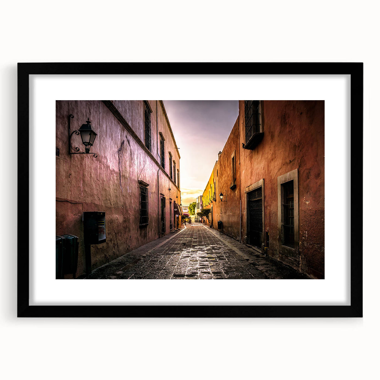 Colorful abstract art print of Mexico City scenery on a large framed canvas with textured details.