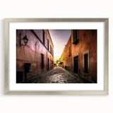 Textured abstract art print of Mexico City in muted earth tones on a silver-framed mat, ideal for bedroom decor.