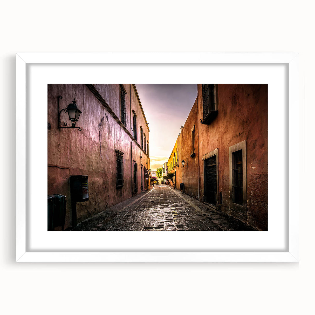 Abstract art print of Mexico City with vibrant colors on a white-framed mat, ideal for dining room decor.