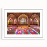 Abstract art print of a Middle Eastern scenery in muted earth tones on a white framed canvas, suitable for dining room decor.